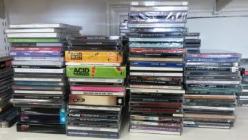 Photo of CDs, stacked and ready for transferring
